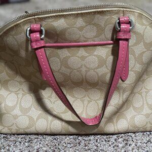 Signature canvas satchel from Coach.